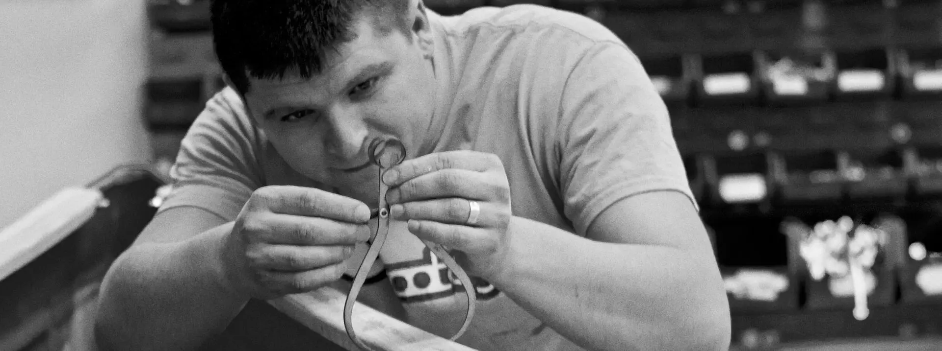 Expert boat maker assembling boat