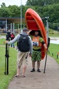 BPM Airbags Pair inside silverbirch whitewater canoe being carried by man